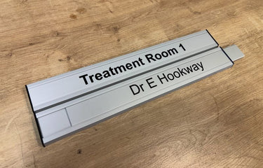 Double nameplate interchangeable sign