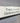 hanging directional sign