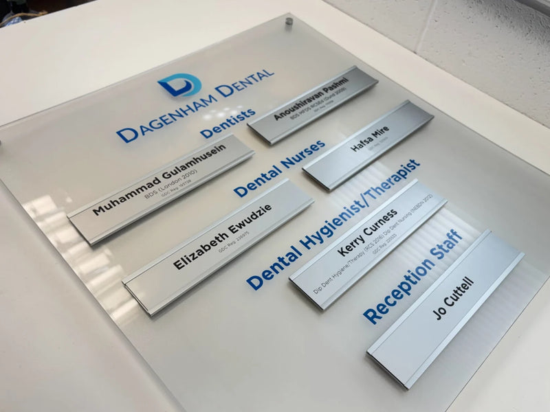 Dagenham Dental staff directory with individual nameplates grouped under dentists, nurses, hygienist and reception