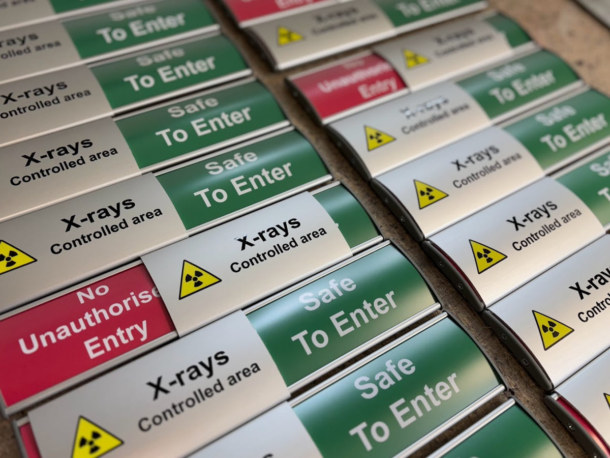 Custom controlled area sliding door signs