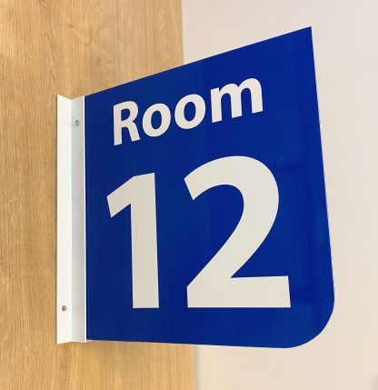 Blue protruding room number signs